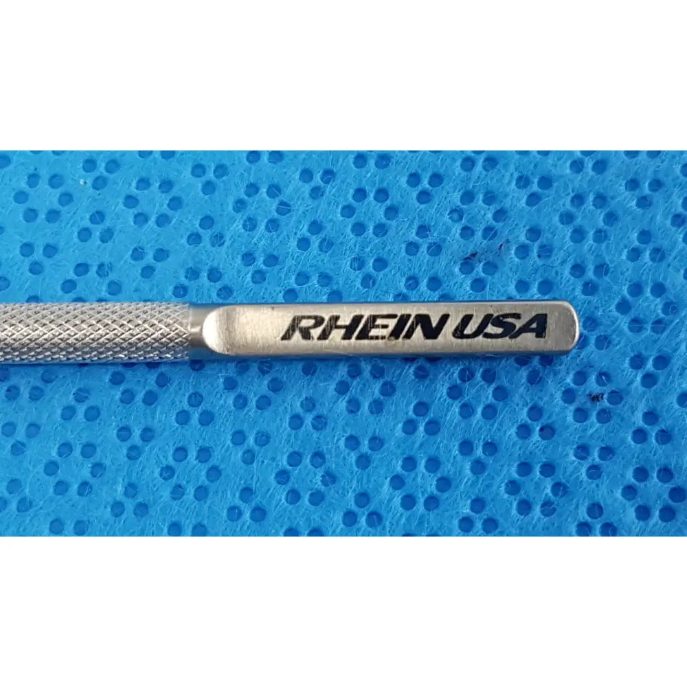 Silver metallic titanium lindstrom star manipulator with textured grip and rhein usa engraving on handle
