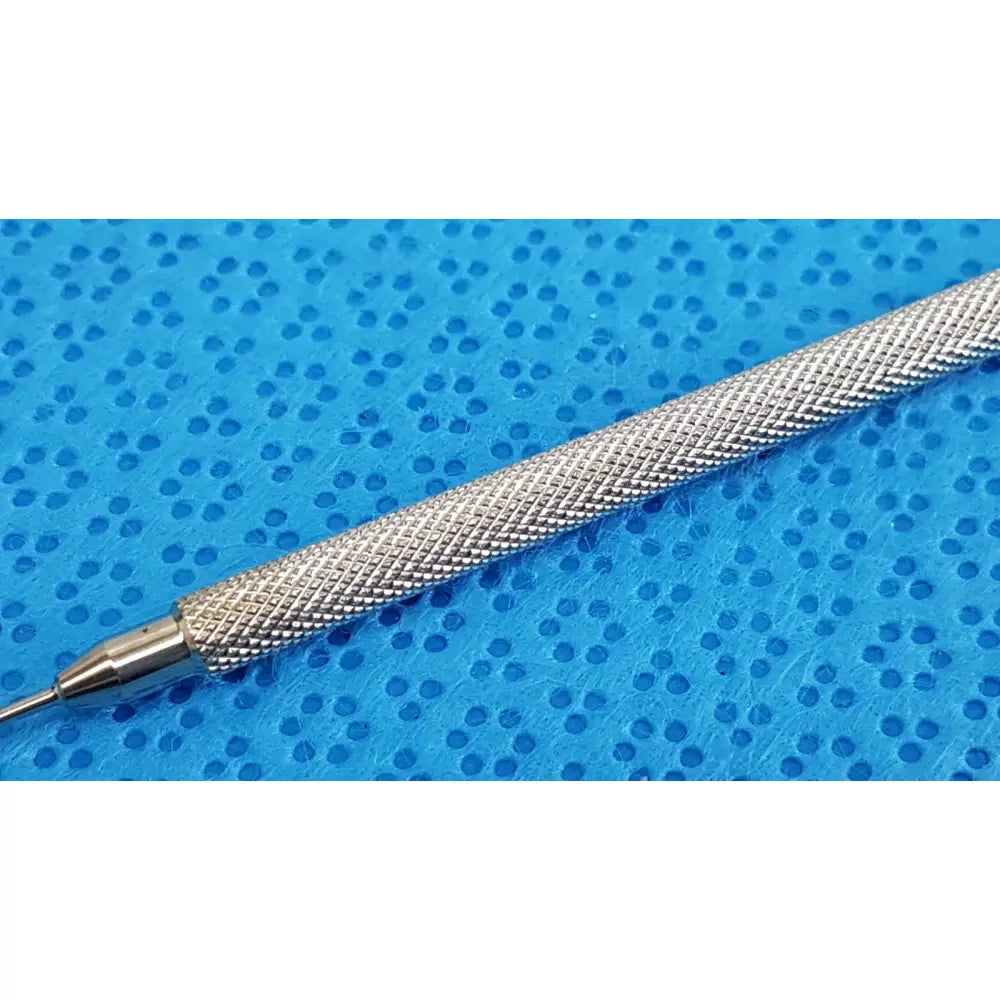 Silver-colored titanium lindstrom star manipulator with textured diamond grip and fine pointed tip for watchmaking use