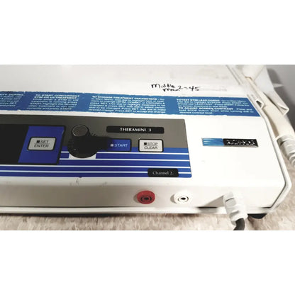 White and blue striped theramini 3 medical device with black knobs for the rich-mar theramini 3c combo ultrasound electrical unit