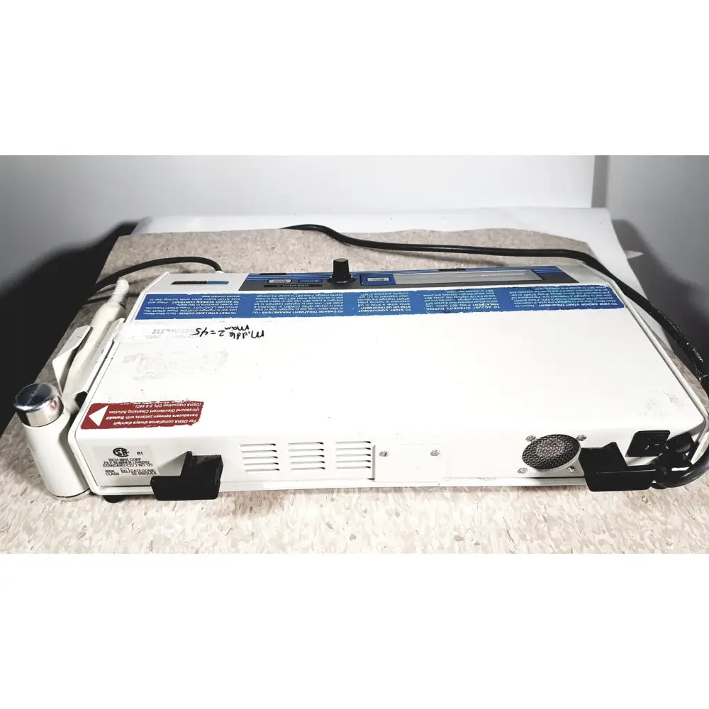 White rich-mar theramini 3c combo ultrasound electrical stimulation unit with blue control panel black cables and metallic knob