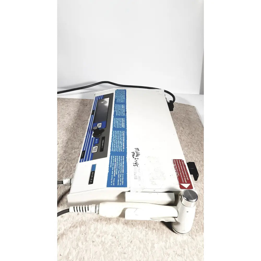 White rich-mar theramini 3c combo ultrasound electrical unit with blue control panel, silver handle, and black cables