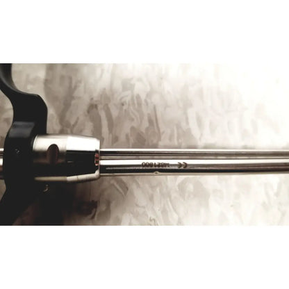 A sleek metallic richard wolf m821800 resectoscope with black ergonomic handle and polished stainless steel shaft for reuse medical use