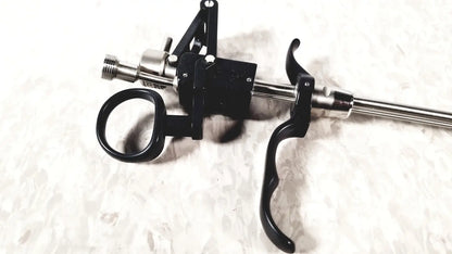 Black and silver surgical instrument with ergonomic handles of richard wolf m821800 resectoscope designed for reuse medical use