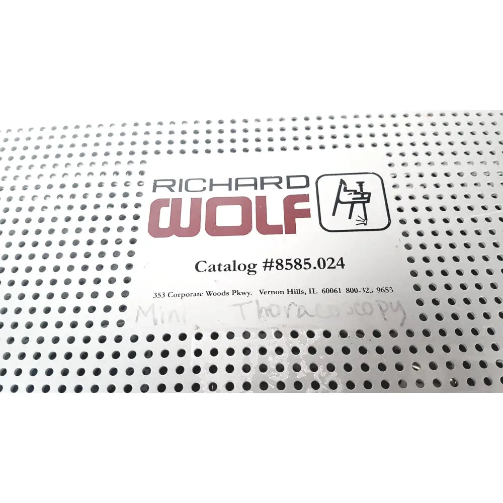 Richard Wolf 8585.024 mini cystoscope tray label with red and black text on white perforated metal surface