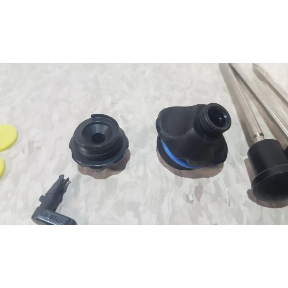 Black plastic spray nozzle with blue rubber seal and threaded connection for richard wolf mini cystoscope tray 8585.024