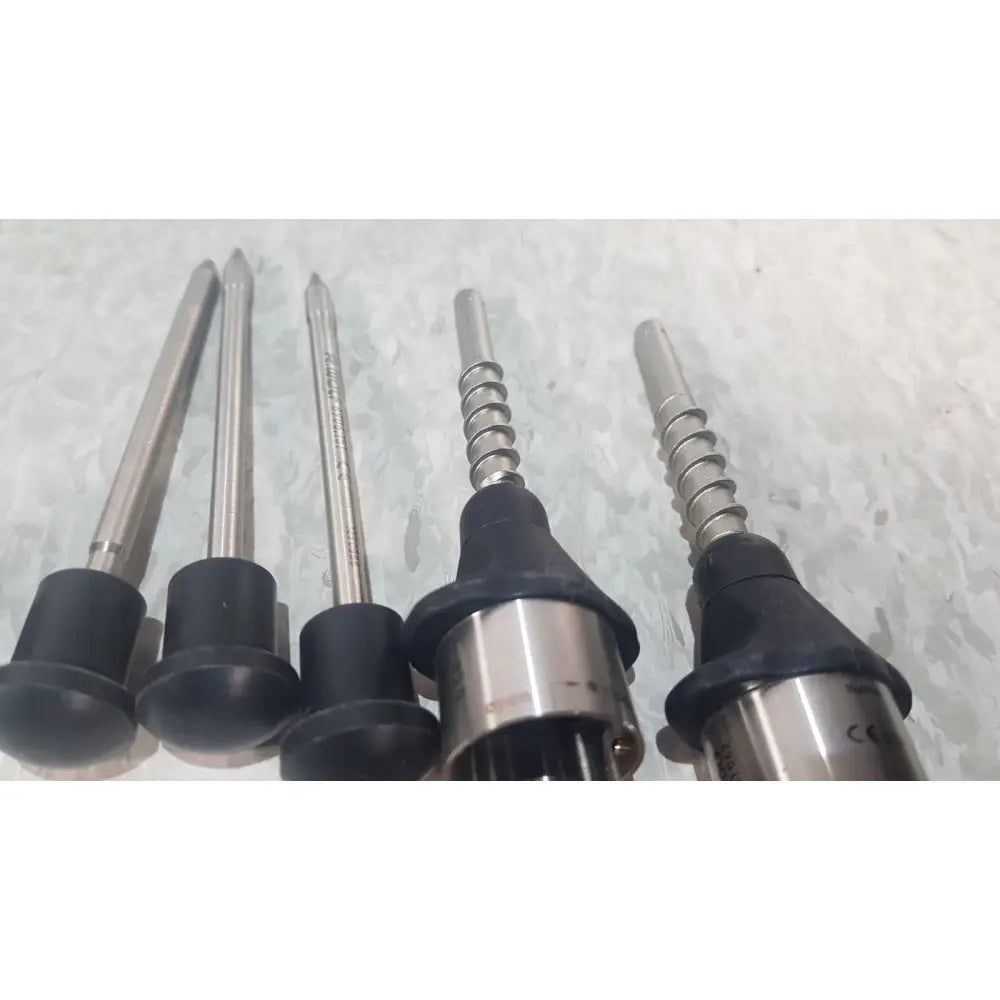 Five metallic drill bits with black rubberized handles in the richard wolf 8585.024 mini cystoscope tray for precise drilling tasks