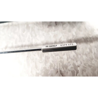 Silver richard wolf 8379.672 precision measuring tool with polished metallic finish and black-tipped handle for mini cystoscope tray
