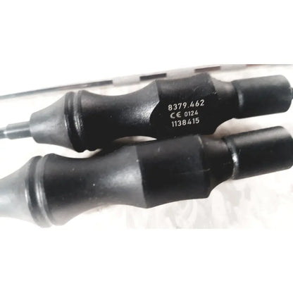 Black rubber-handled tool with metallic shaft and engraved serial numbers from richard wolf mini cystoscope tray 8585.024