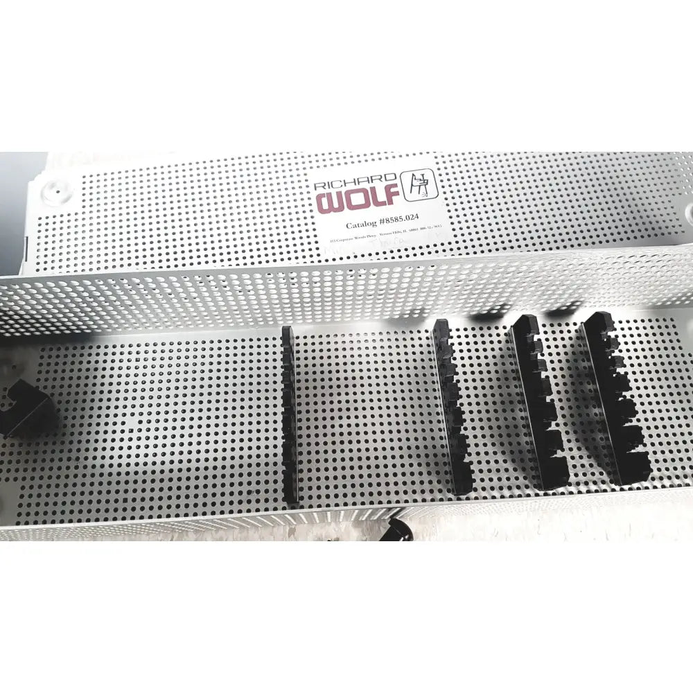 Silver perforated metal mini cystoscope tray with black plastic components branded richard wolf model 8585.024