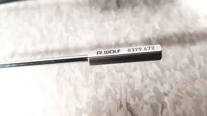 Silver richard wolf 8379.672 precision measuring tool with polished metallic finish and black-tipped handle for mini cystoscope tray