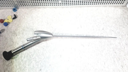 Silver surgical mini cystoscope with black grip and metallic shaft in richard wolf 8585.024 mini cystoscope tray