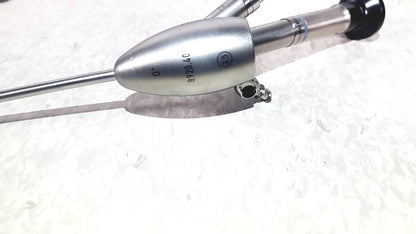 Silver surgical endoscope with sleek metallic body and black-tipped handle in richard wolf 8585.024 mini cystoscope tray