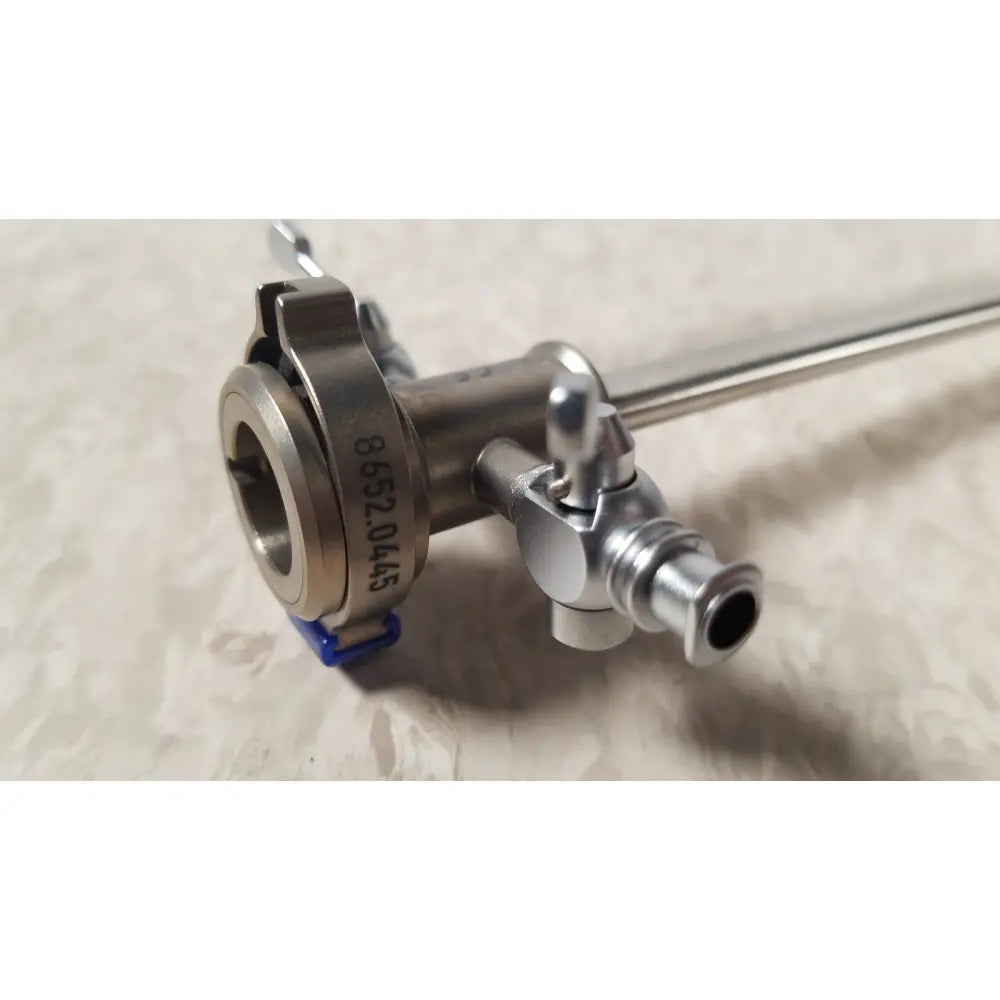 Silver richard wolf endoscope sheath 10fr instrument with cylindrical body, threaded connections, and engraved markings