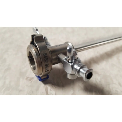 Silver richard wolf endoscope sheath 10fr instrument with cylindrical body, threaded connections, and engraved markings