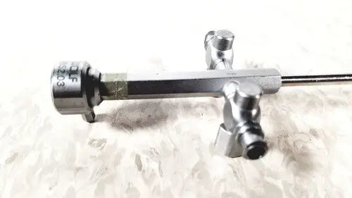 Silver richard wolf 8852.03 sheath with cylindrical body and metallic joints for reuse medical endoscope connection