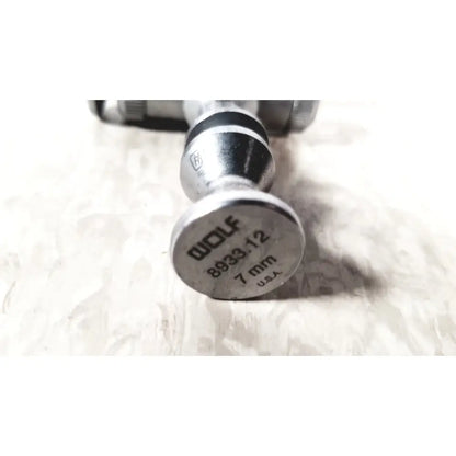 Silver metal caliper with engraved richard wolf 8933.12 marking measuring 7mm endoscope sheath diameter made in usa