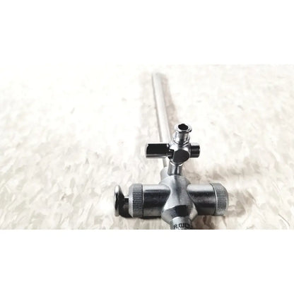 Silver-colored metal gas regulator with cross-shaped body and valve knob for richard wolf 7mm endoscope sheath use