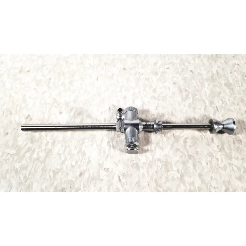 Silver-colored metal richard wolf 8933.01 7mm endoscope sheath with long slender shaft and articulated control knobs