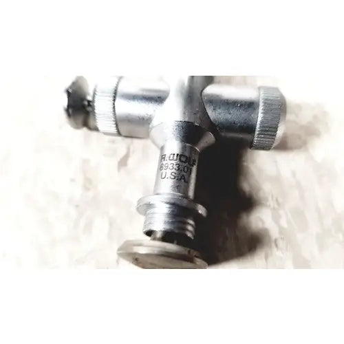 Silver metallic three-way gas regulator with engraved markings for richard wolf scope sheath reuse medical applications