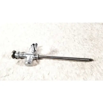 Silver richard wolf scope sheath with trocar endoscope featuring a long slender shaft and three control knobs at handle