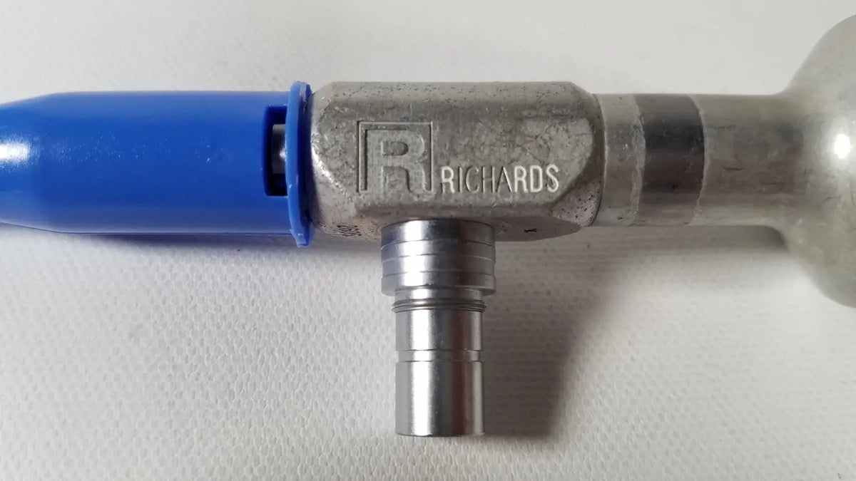 Richards wolf metal air hose connector with blue plastic tip and threaded fittings for reuse medical applications