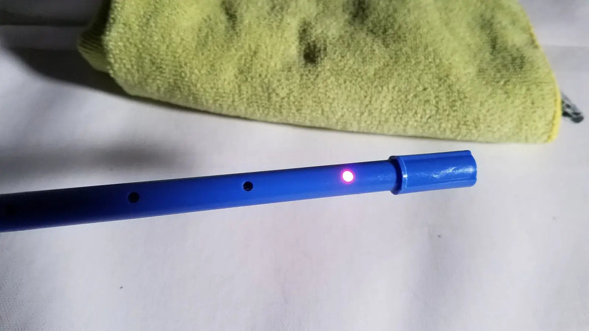 Richards wolf 4.0 mm 70° arthroscope in blue plastic with glowing pink light for reuse medical applications