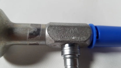 Silver metallic Richards Wolf 4.0 mm 70° arthroscope pipe fitting engraved 70° Germany connected to blue hose for reuse medical use
