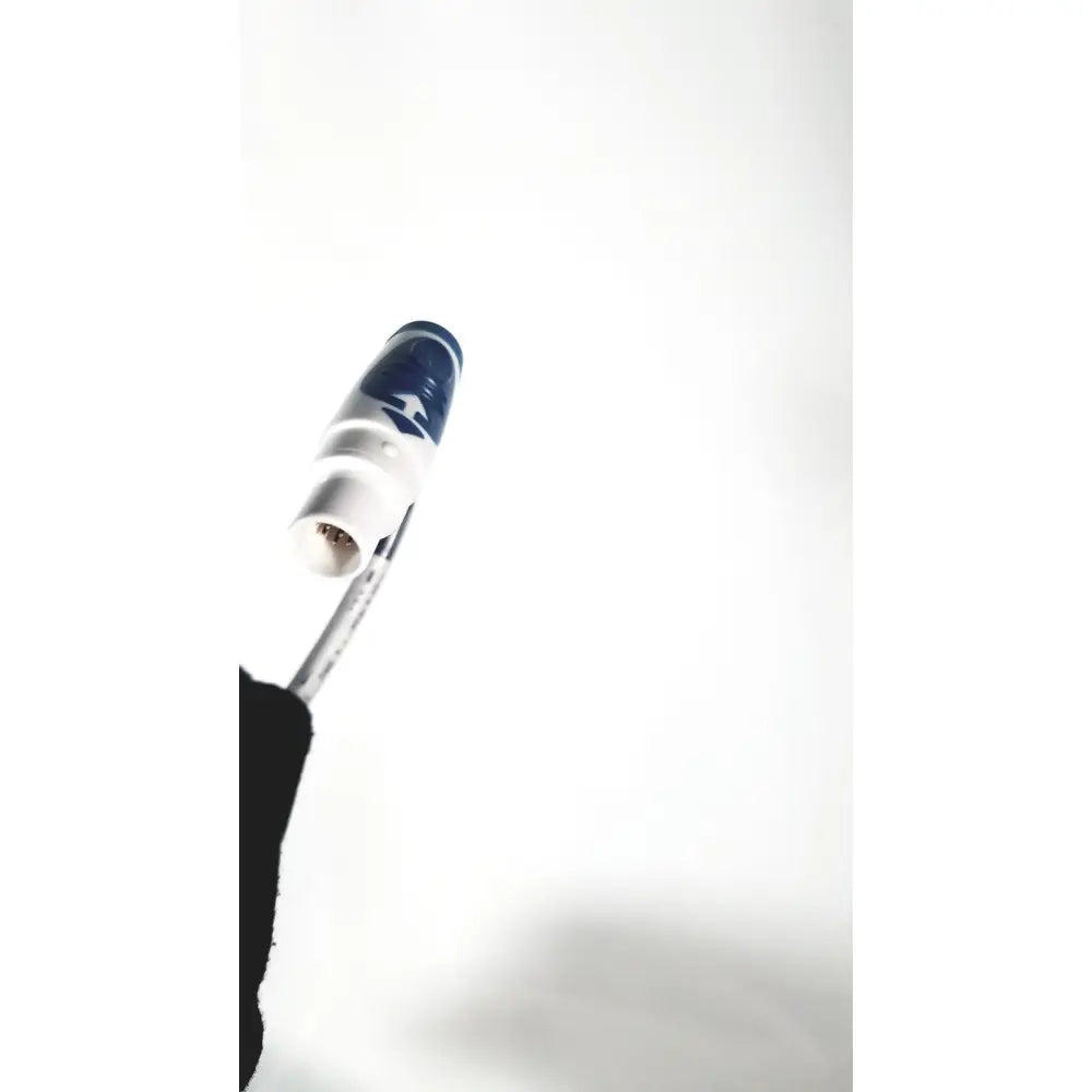 A sleek white and blue ceramic pen tip with a glossy finish on the richmar winner evo st4 electrical therapy cart