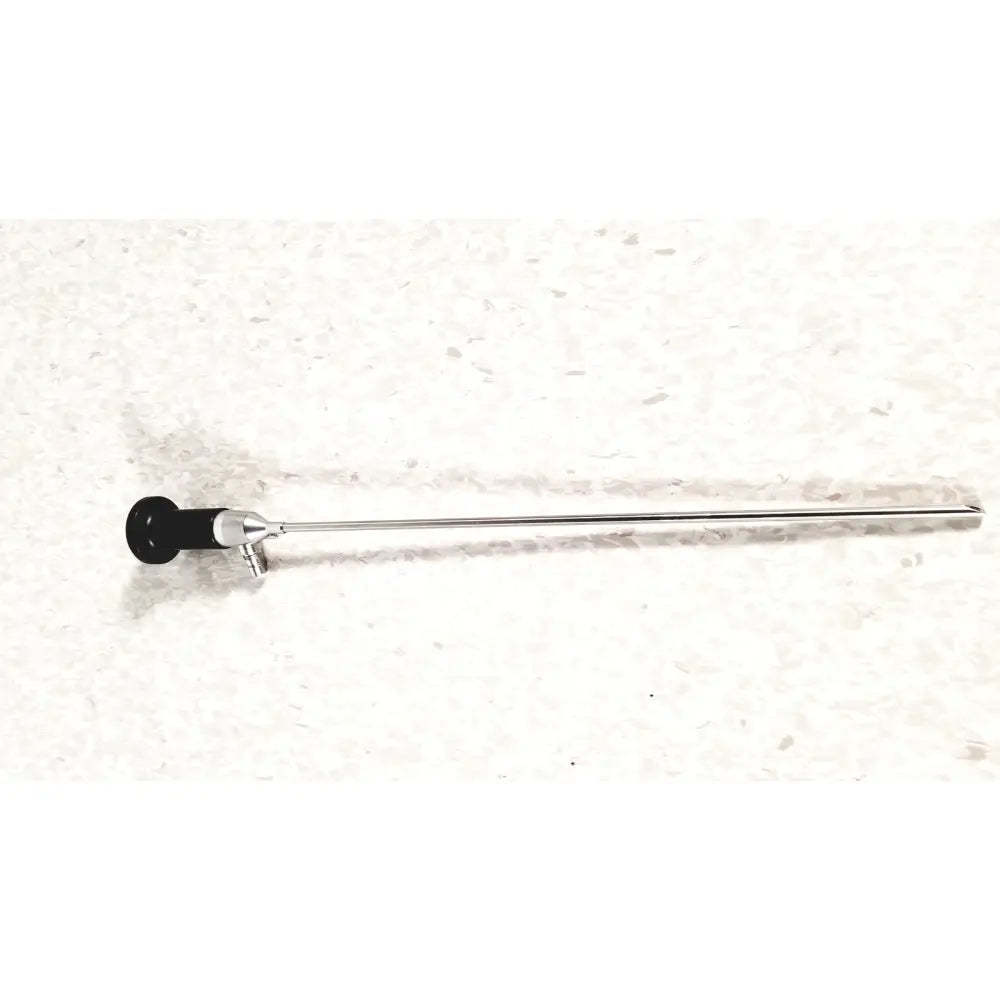 Silver rigid cystoscope 94509 with black handle and metallic joints designed for reuse medical procedures