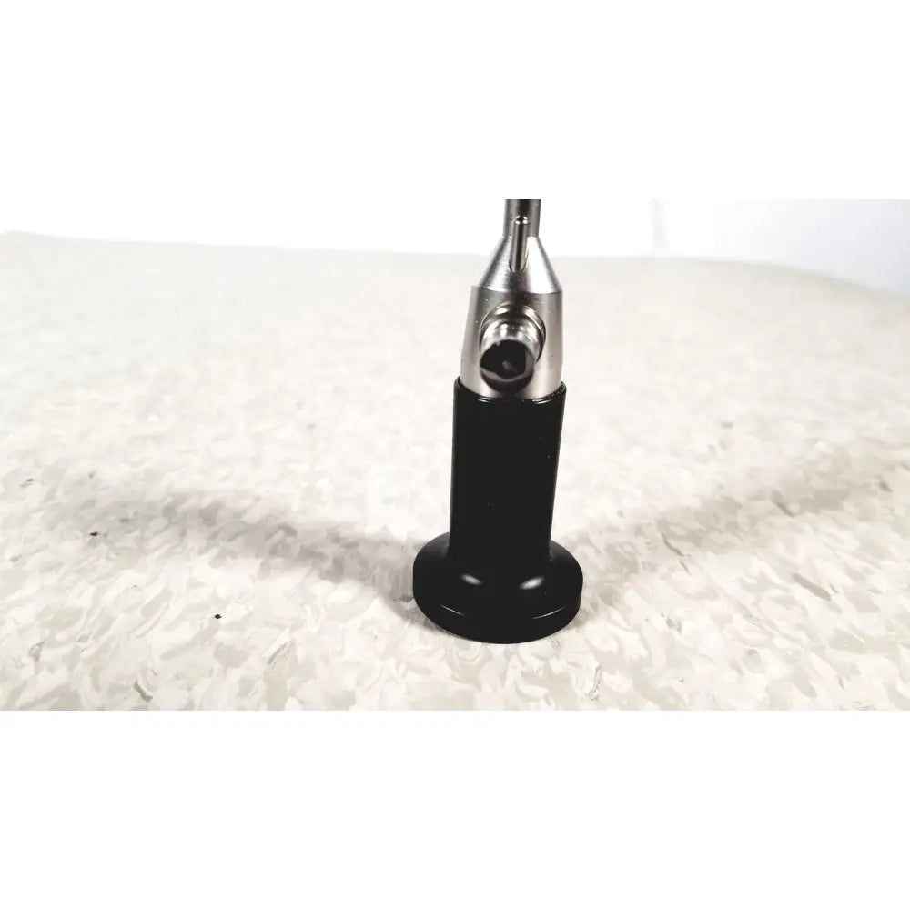Rigid cystoscope 94509 black and silver reuse medical instrument with cylindrical handle metallic shaft and precision tip