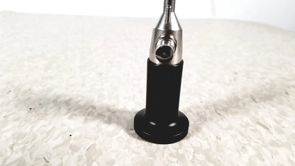 Rigid cystoscope 94509 black and silver reuse medical instrument with cylindrical handle metallic shaft and precision tip