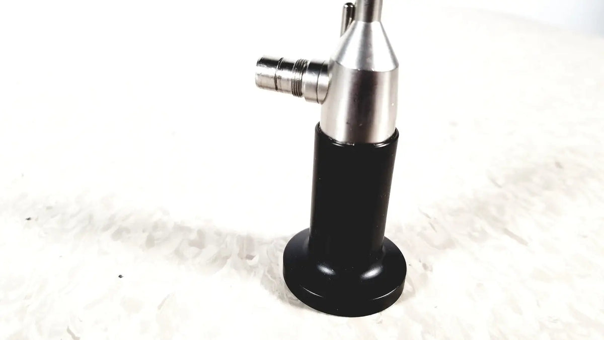 Rigid cystoscope 94509 with silver and black cylindrical body, threaded port, and rounded base for reuse medical use