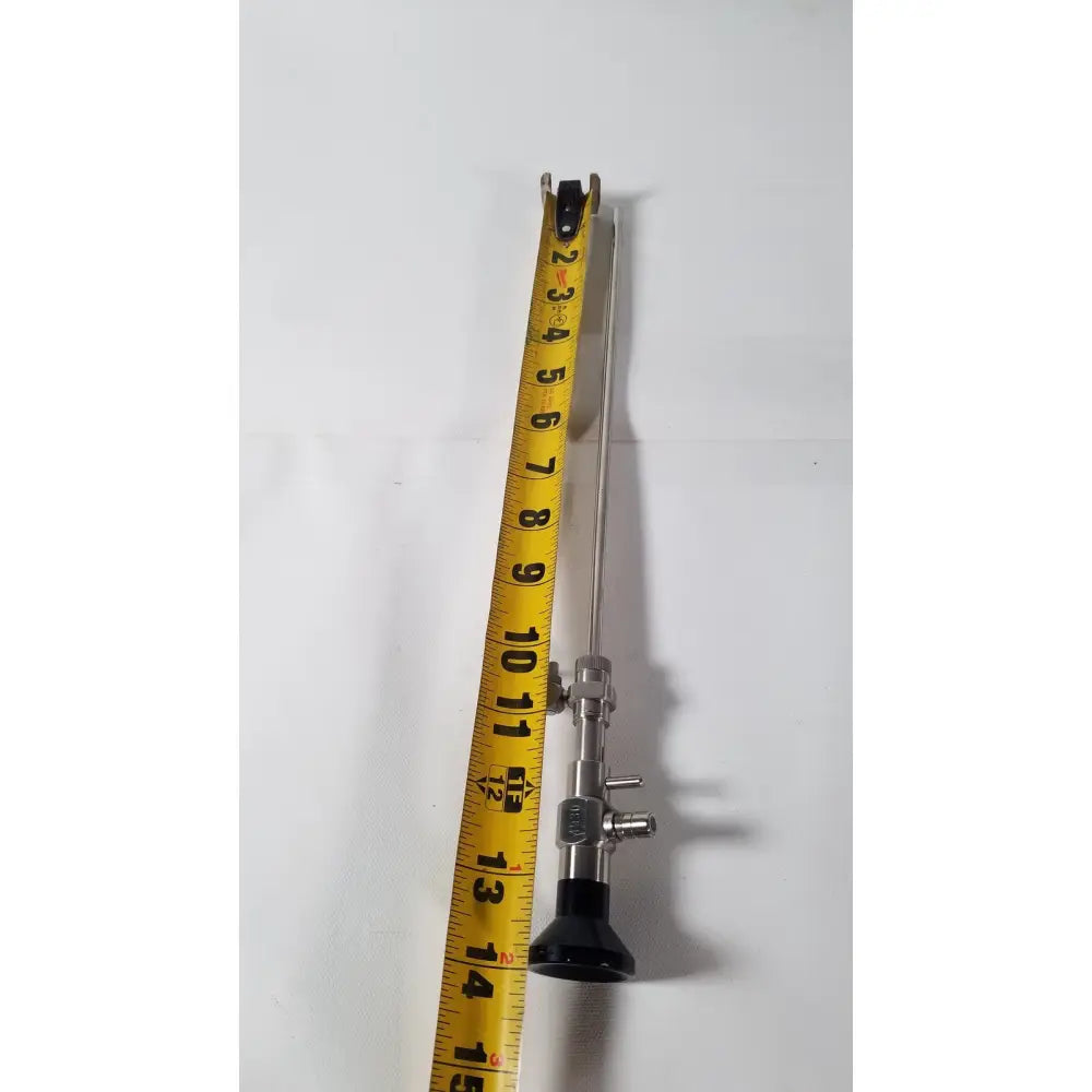 Rigid hysteroscopes endonest endoscope 01206 silver surgical metal with black grip and yellow tape for scale