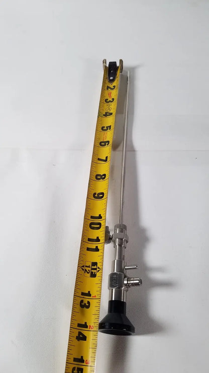 Rigid hysteroscopes endonest endoscope 01206 silver surgical metal with black grip and yellow tape for scale
