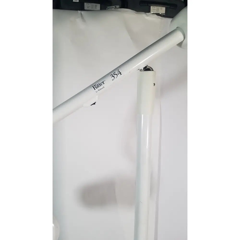 White ritter 354 metal frame with sleek cylindrical design and matte finish for portable surgery procedure light by ritter midmark