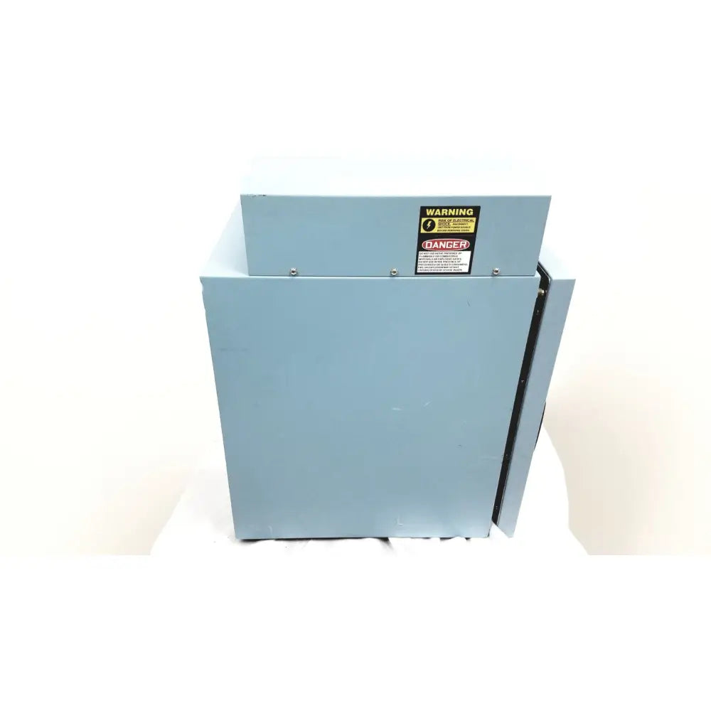 Light blue robbins scientific hybridization incubator model 400 temperature controller with a warning label on top