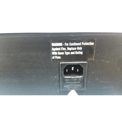 Black power supply with rectangular ac input port and fuse warning label on the back of robbins scientific hybridization incubator model 400 temperature controller