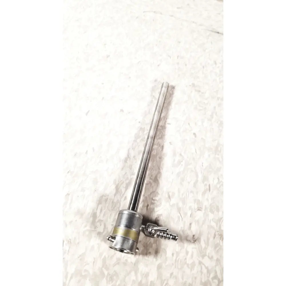 Stainless steel rotating single stopcock cannula with long slender shaft and threaded connector at base