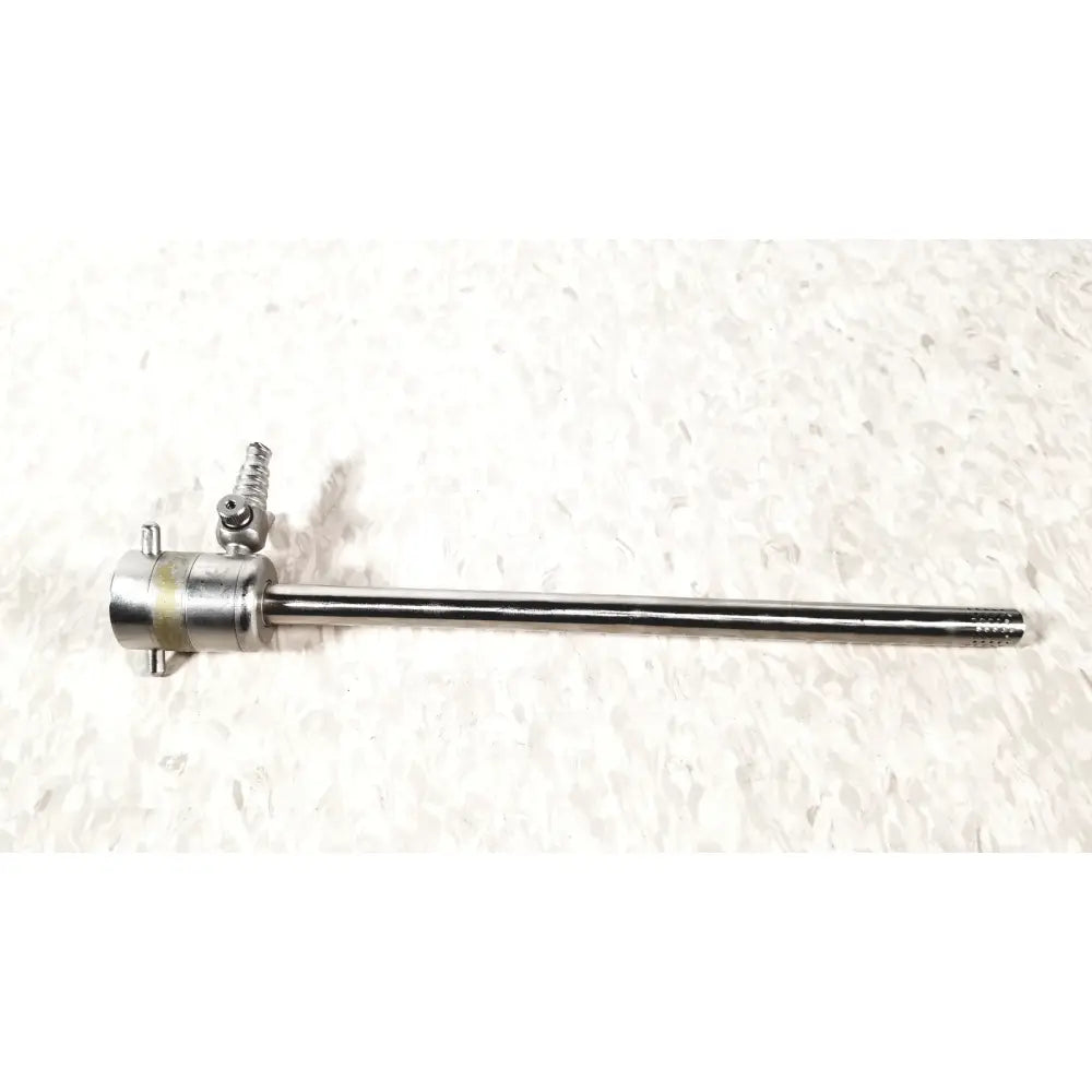 Silver rotating single stopcock cannula with threaded handle and textured tip for precise medical control