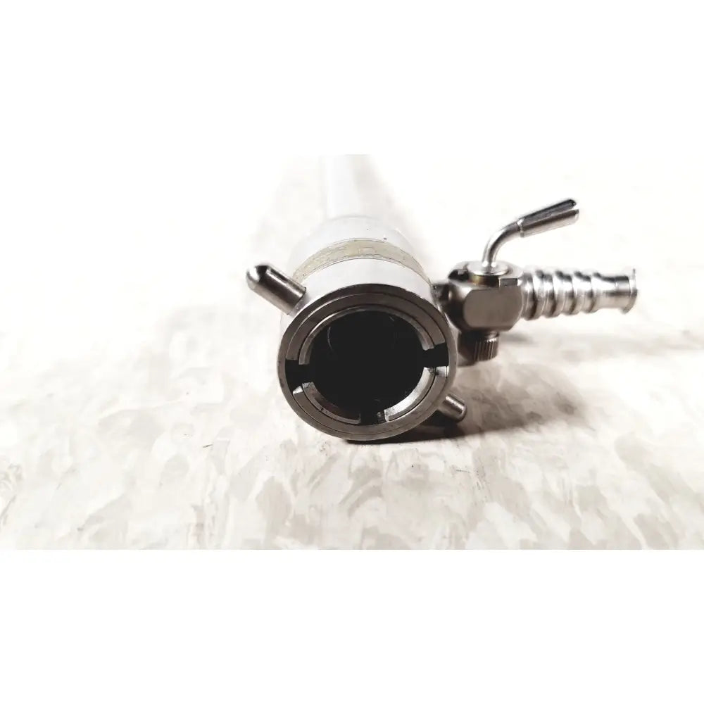 Silver metallic rotating single stopcock cannula with threaded connector and side valve mechanism for medical use