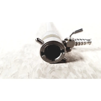 Silver metallic rotating single stopcock cannula with threaded connector and side valve mechanism for medical use