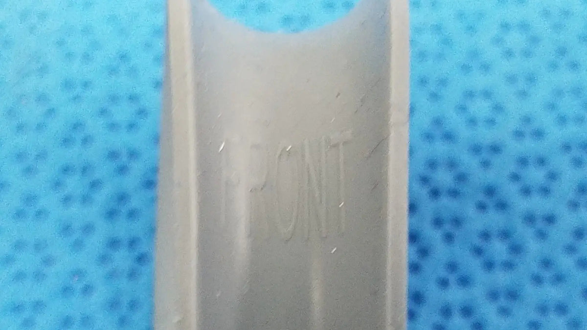 Gray rubber ring juul pod made of plastic with juul engraved for reuse medical purposes front and back view