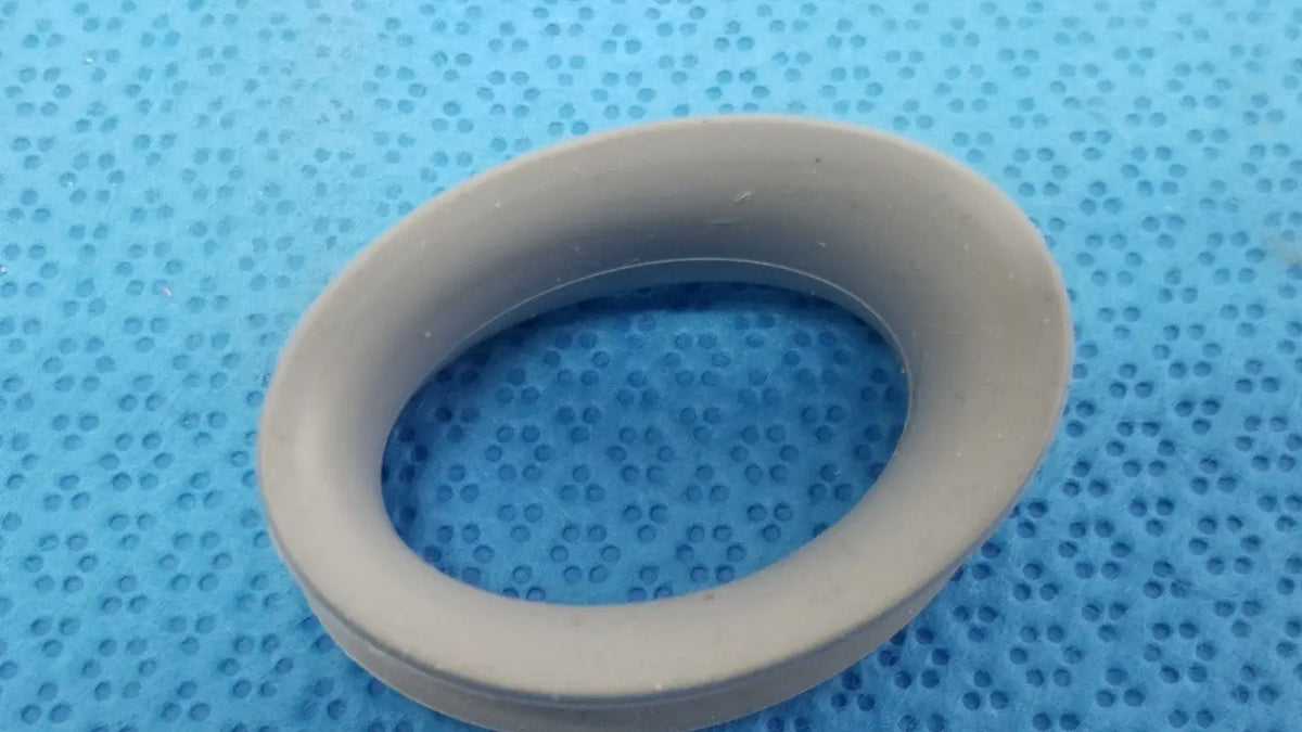Gray rubber ring front side with smooth slightly textured surface suitable for reuse medical applications