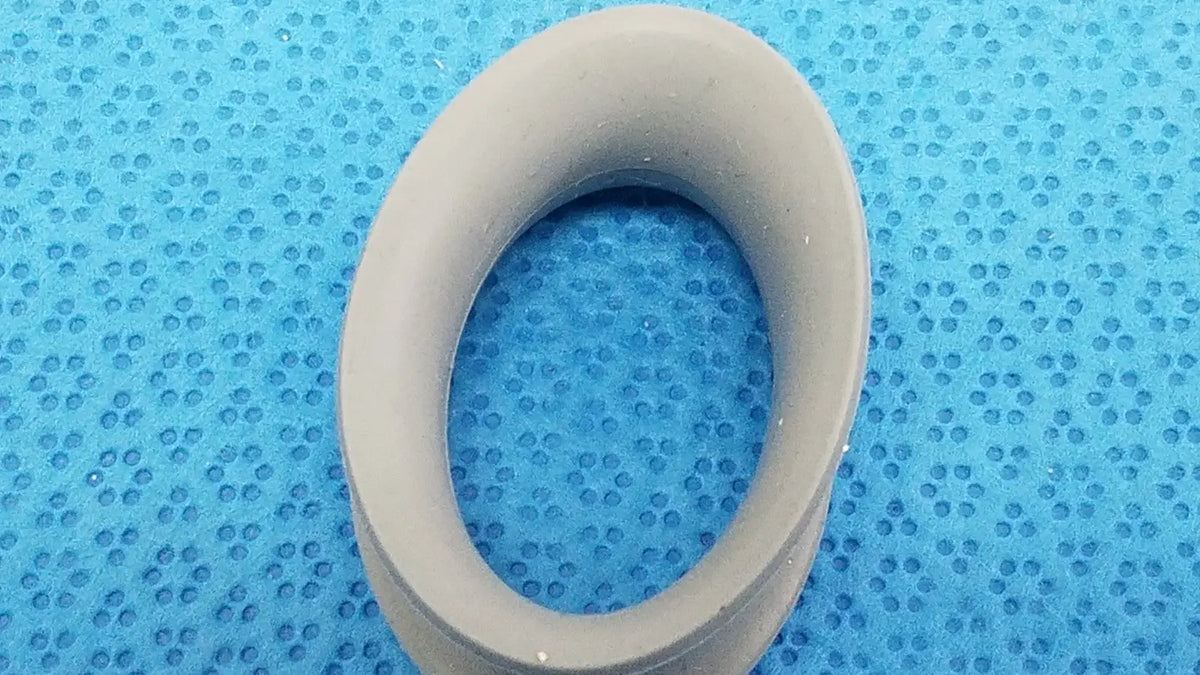 Gray rubber ring front side with smooth textured surface designed for reuse medical applications