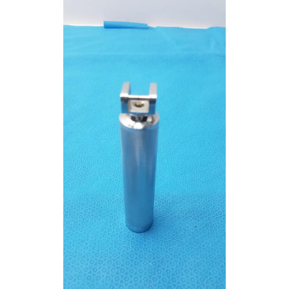 Silver metallic rusch standard laryngoscope handle short stubby with u-shaped top component for medical use