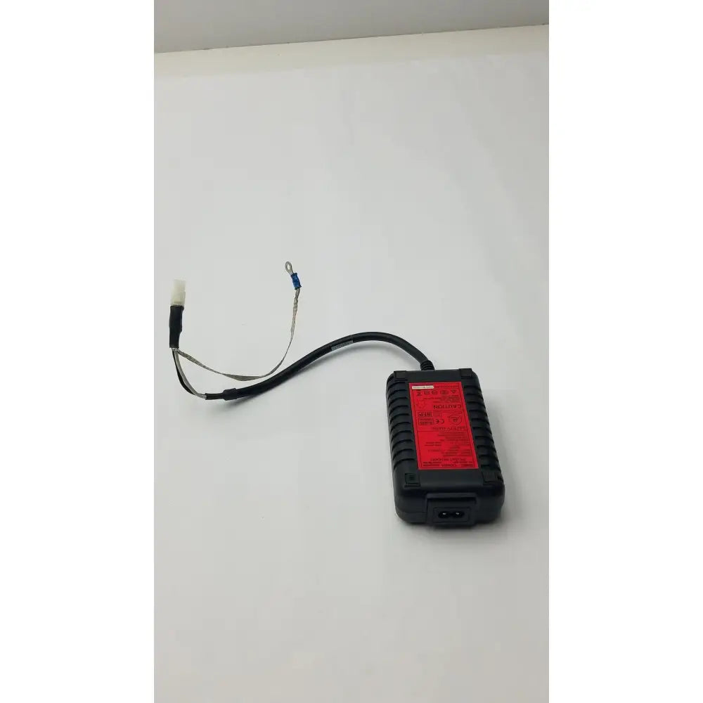 Black rectangular power adapter with red label and white connector for safety mark 2403srm 30 charger