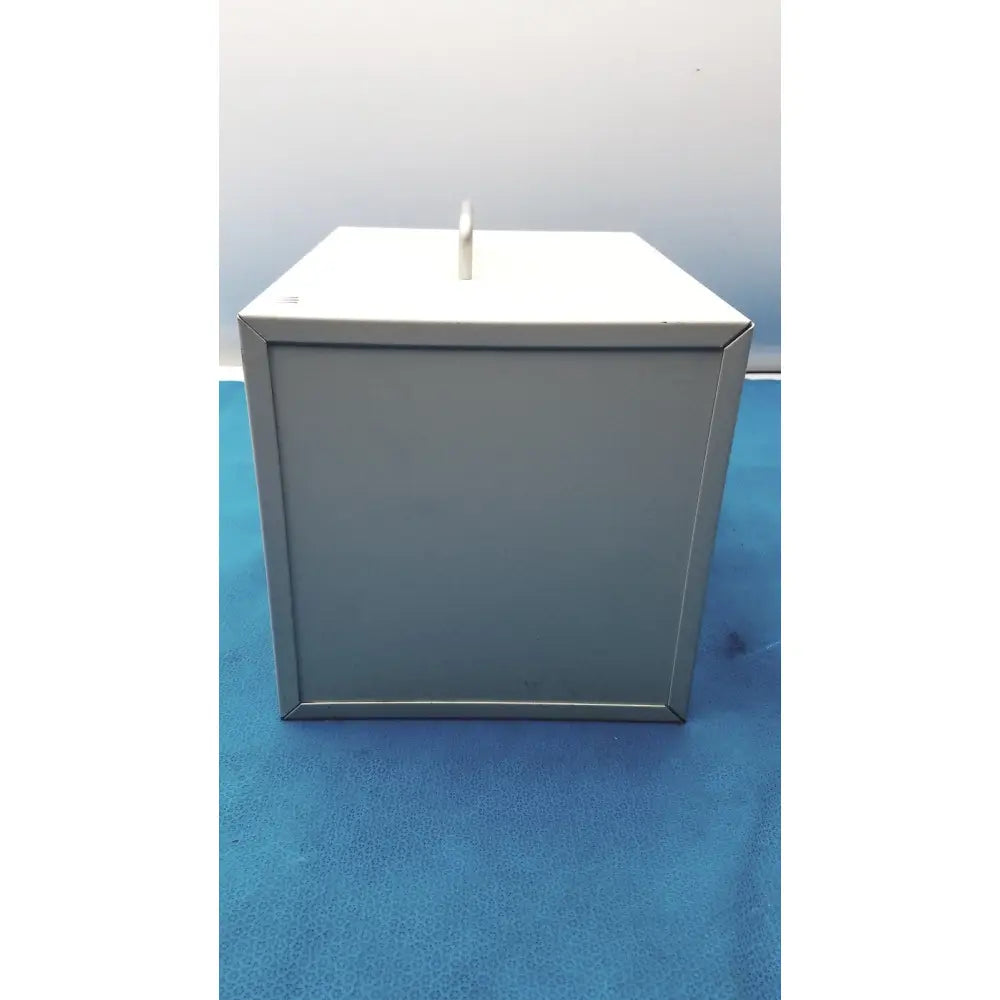 Gray metal ballot box with white slot on top for safEvac smoke evacuator reuse medical applications
