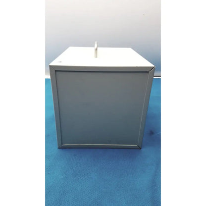 Gray metal ballot box with white slot on top for safEvac smoke evacuator reuse medical applications