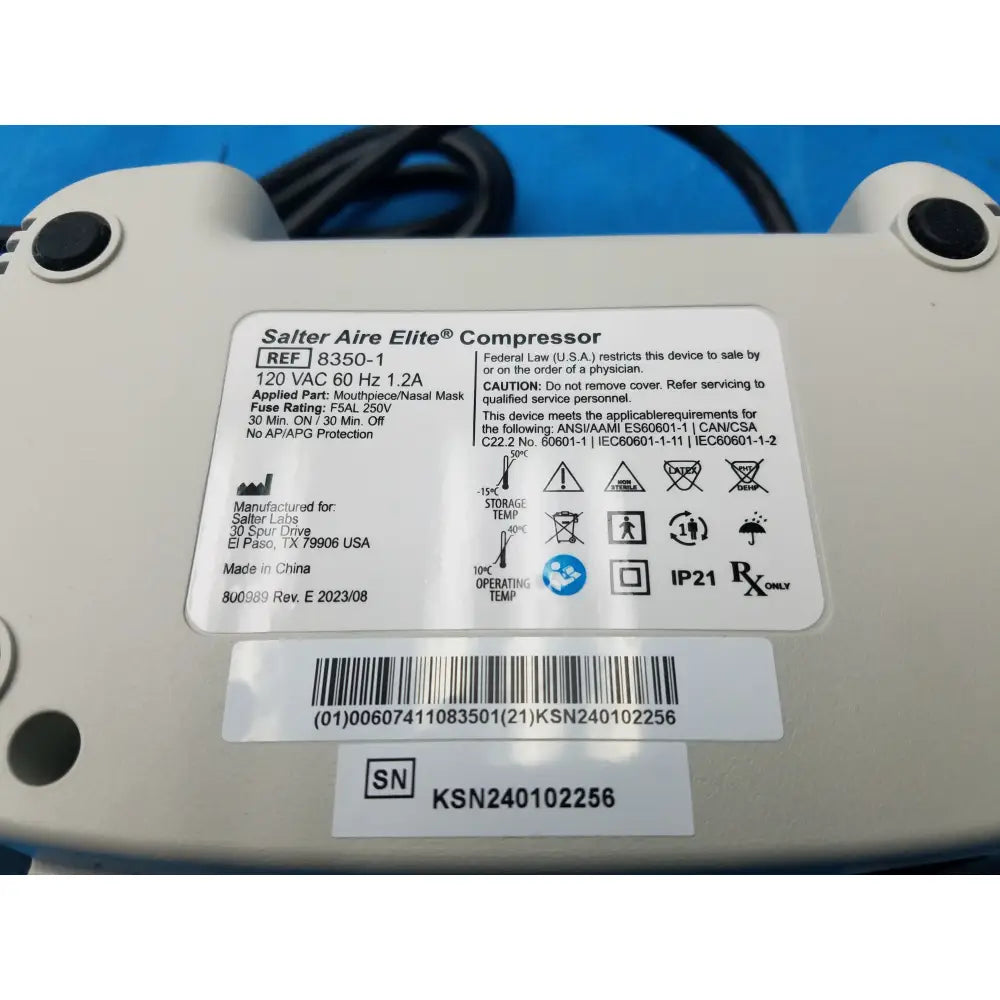White plastic salter labs aire elite compressor nebulizer with black ports and label showing specs and compliance markings