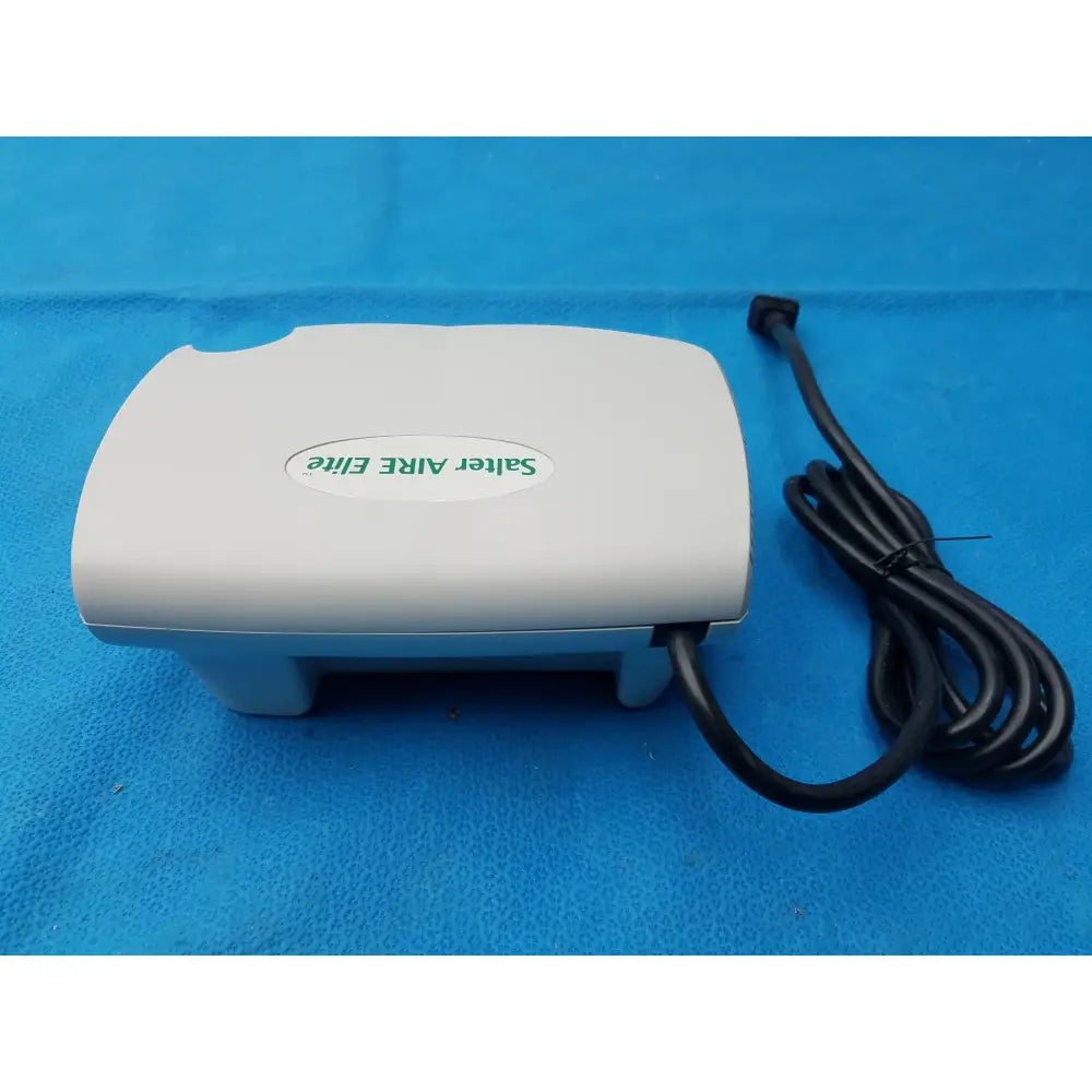 White plastic salter labs aire elite compressor nebulizer with black power cord for respiratory therapy use